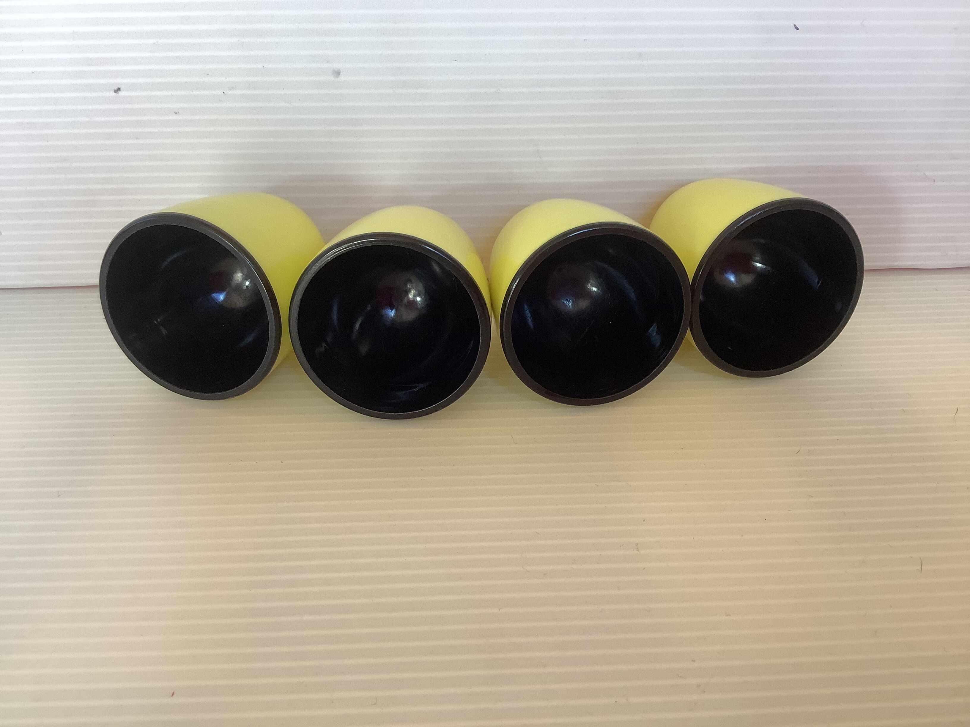4 old eggcups yellow and black Emsa