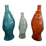 3 glass bottle fish