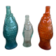 3 glass bottle fish