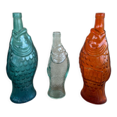 3 glass bottle fish