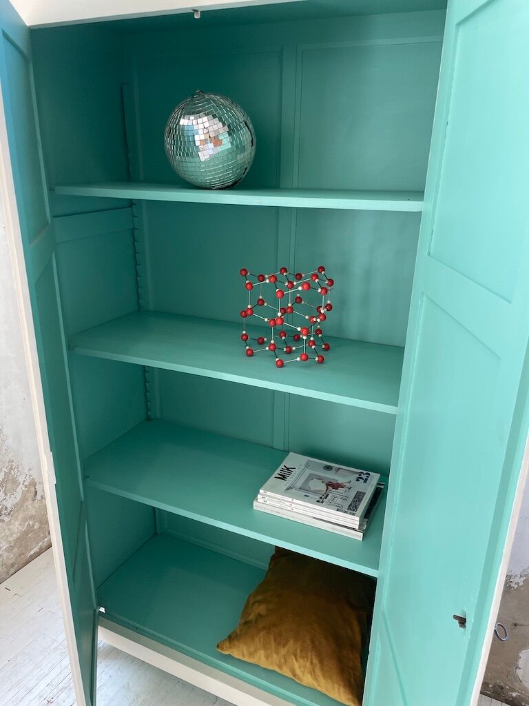 White and green cutter cabinet