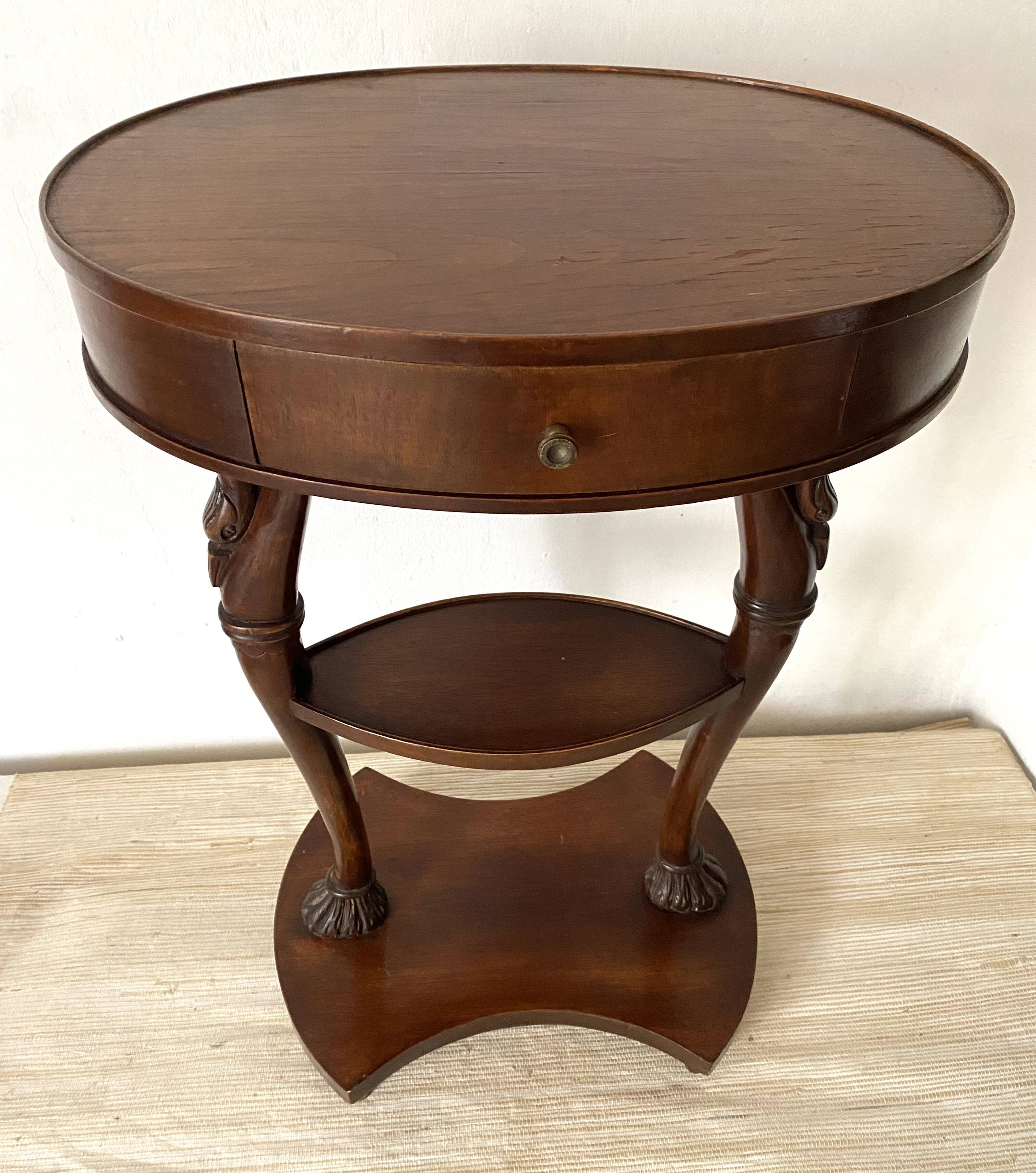 Empire style swan neck and lion paw pedestal table