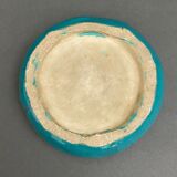 Twentieth century ceramic ashtray decorated with animals on a blue background