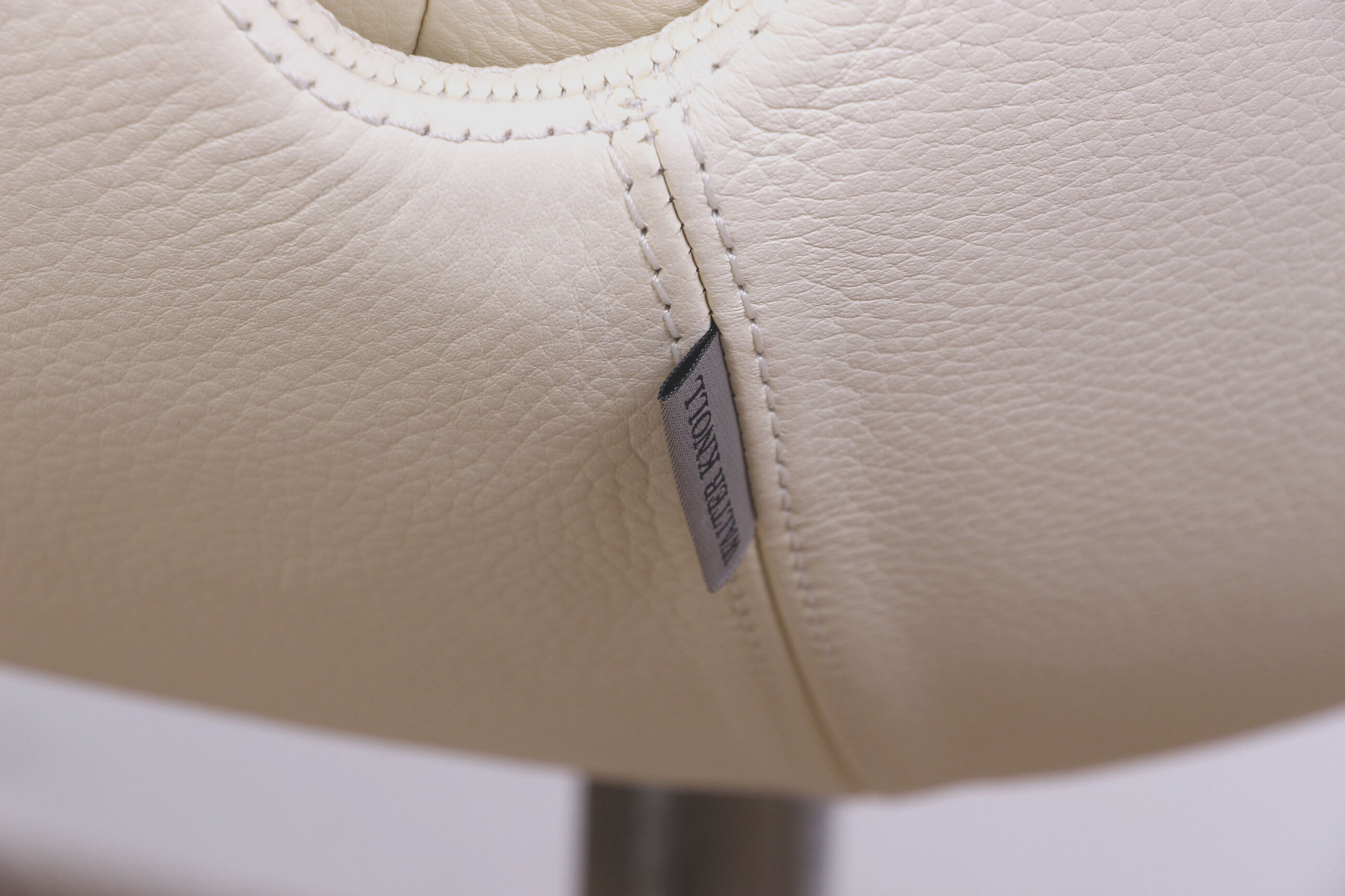 Danish armchair in White Leather and Steel, model FK 6725 or "Tulip chair" by Preben Fabricius.