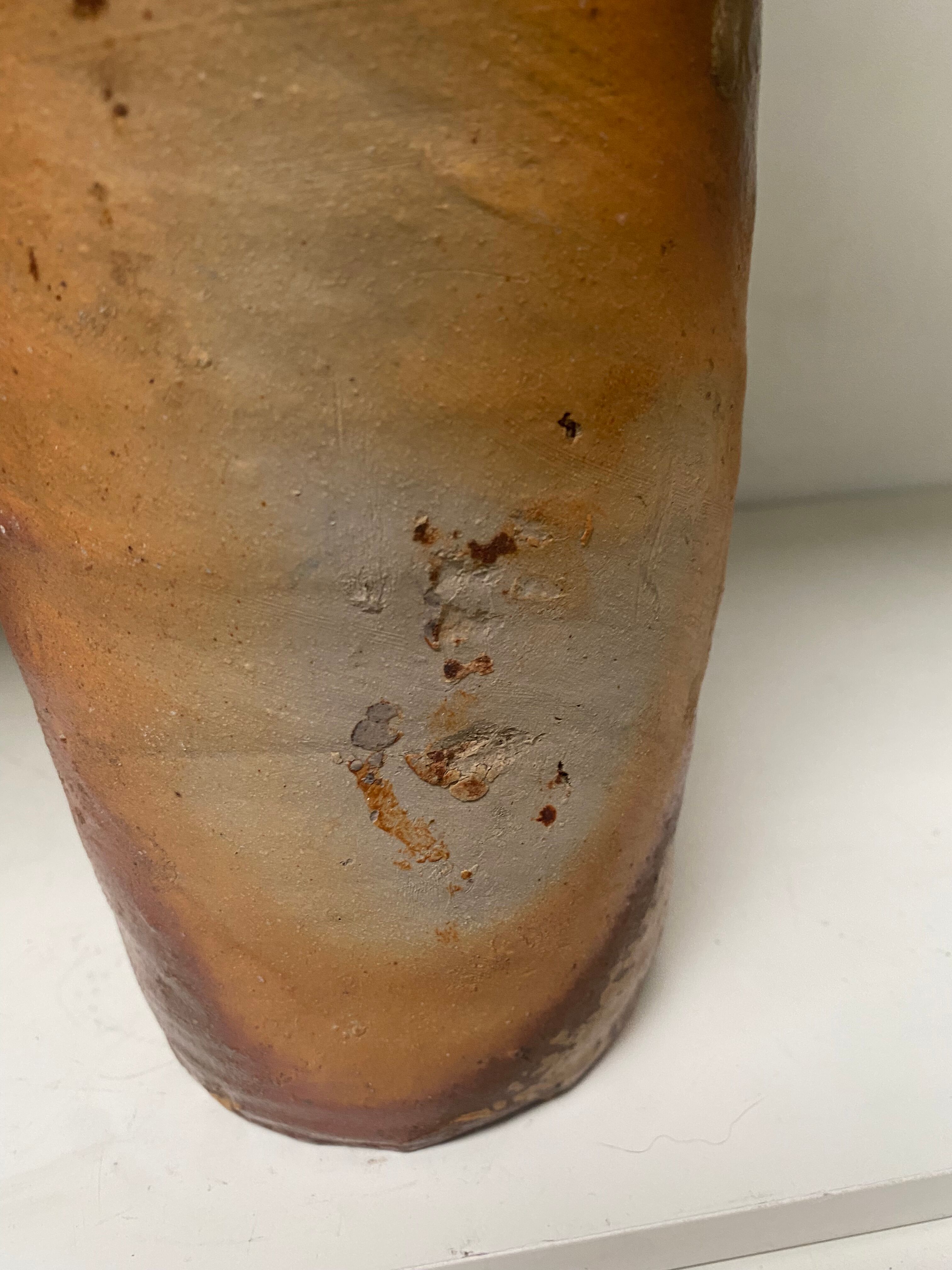 Old sandstone bottle