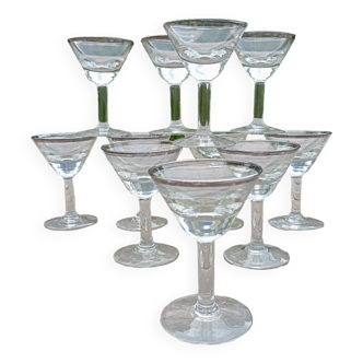 11 bottle-bottom bistro glasses with silver edging, early 20th century
