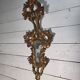 Italian mirror in gilded wood with gold leaf from the 18th century.