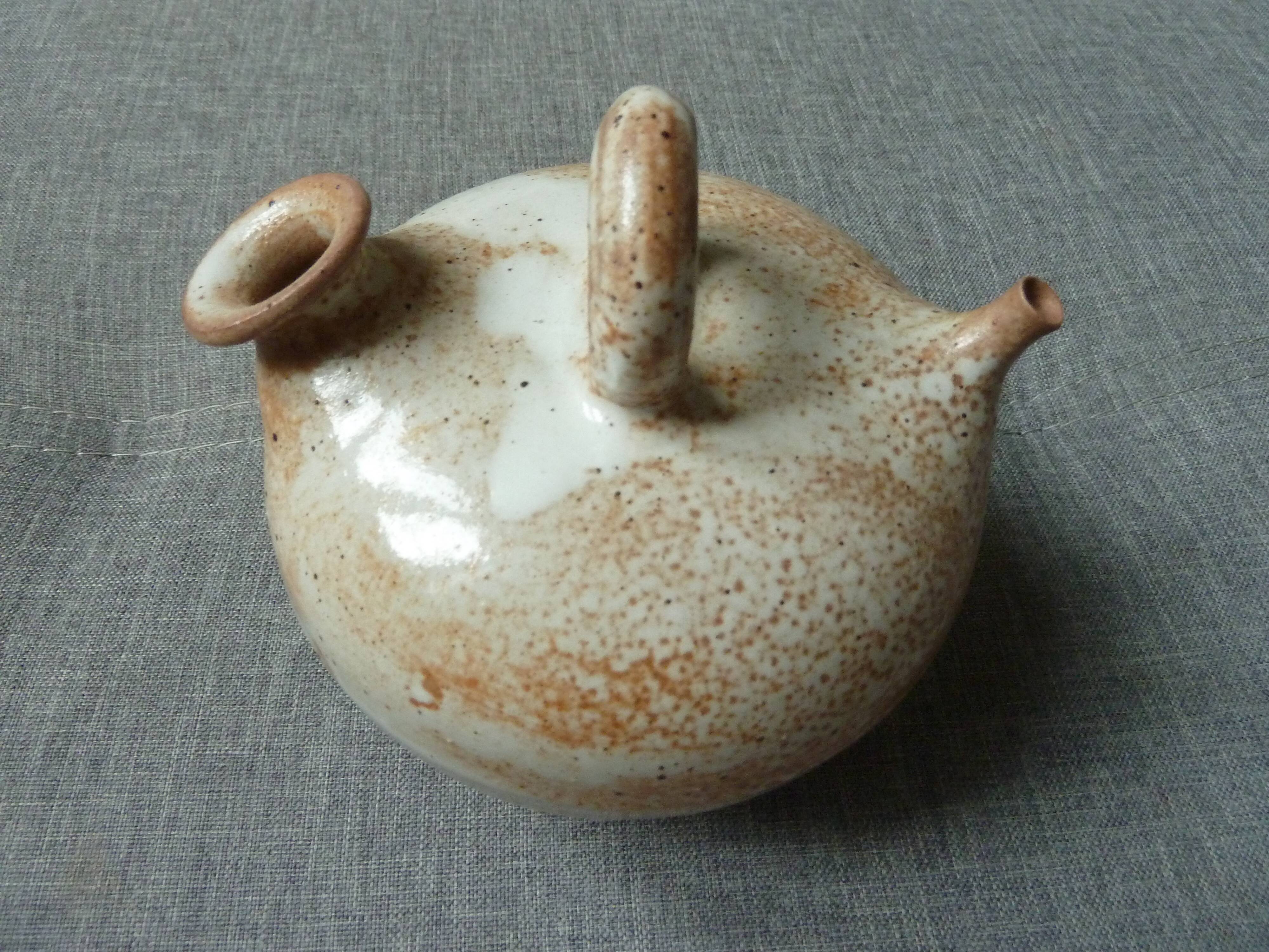 Enamelled sandstone pitcher