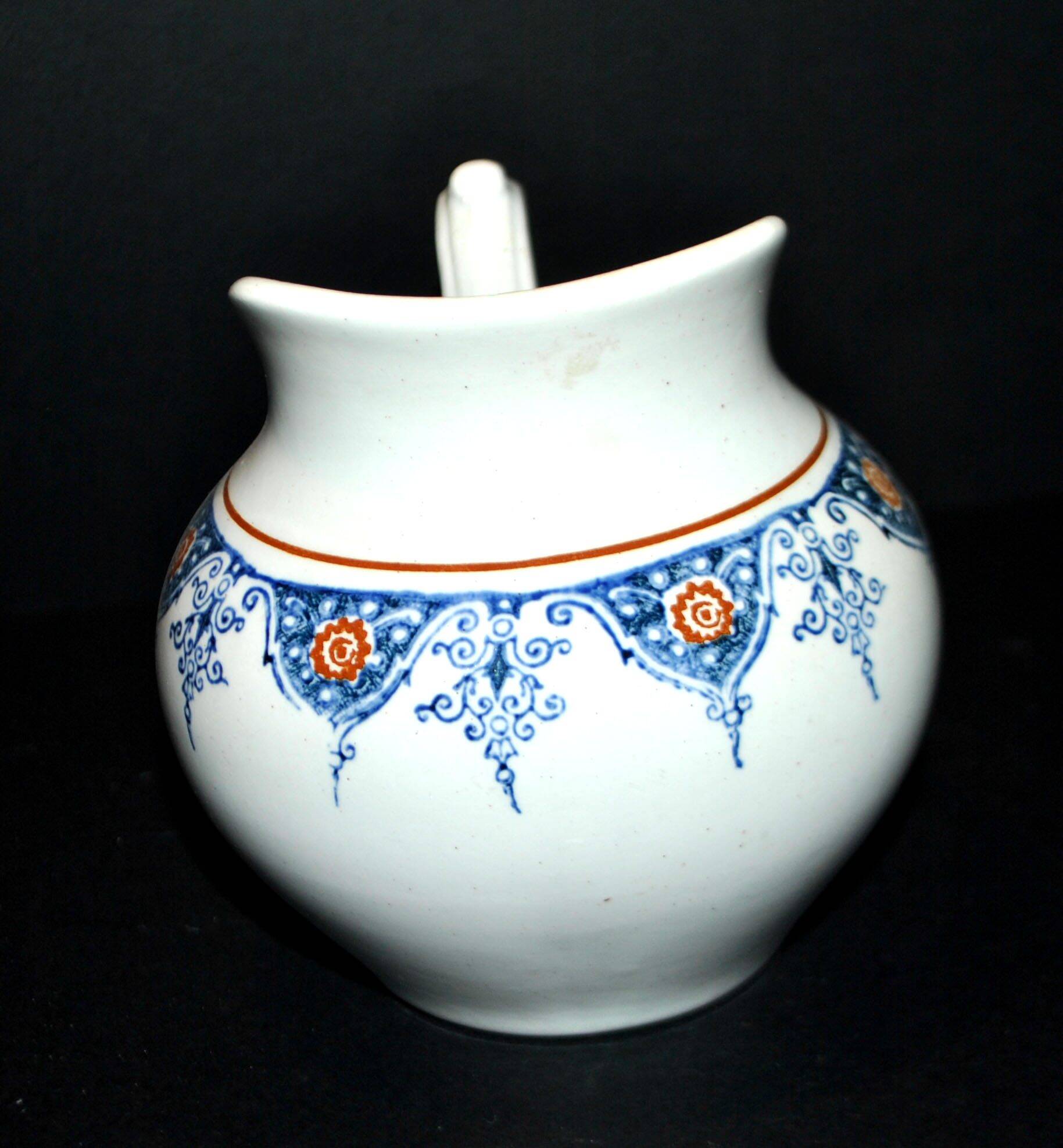 Saint Amand earthenware pitcher with stencil decoration