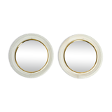 Pair of Mid Century wall mirrors with brass rim and white metal frames