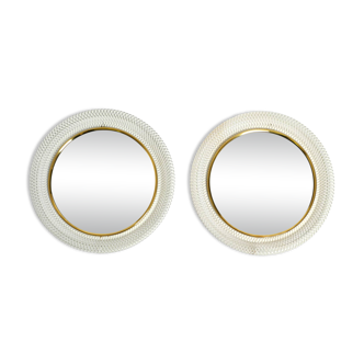 Pair of Mid Century wall mirrors with brass rim and white metal frames