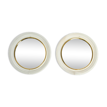 Paire de miroirs ronds en laiton et métal blanc