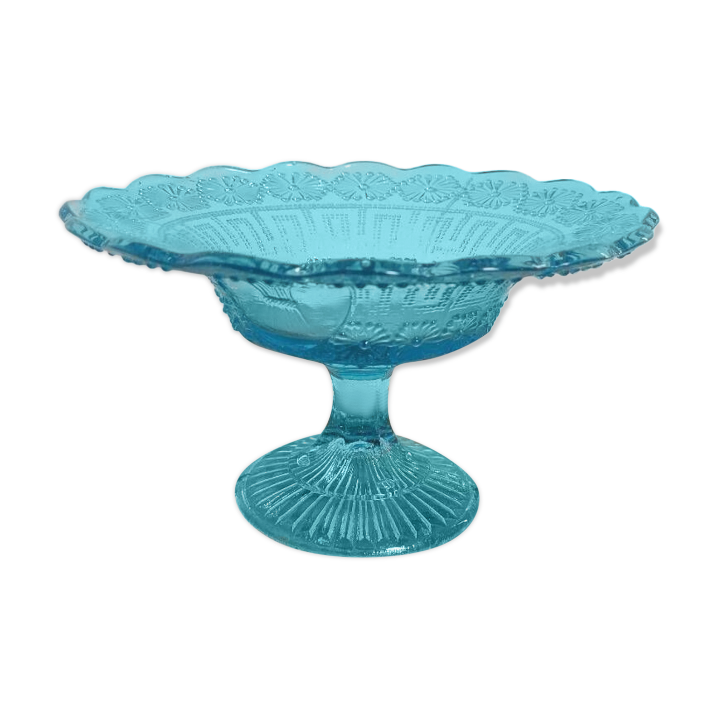 Plate on blue glass pedestal