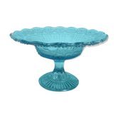 Plate on blue glass pedestal