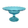 Plate on blue glass pedestal