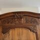 Antique carved wooden wardrobe with cornice.