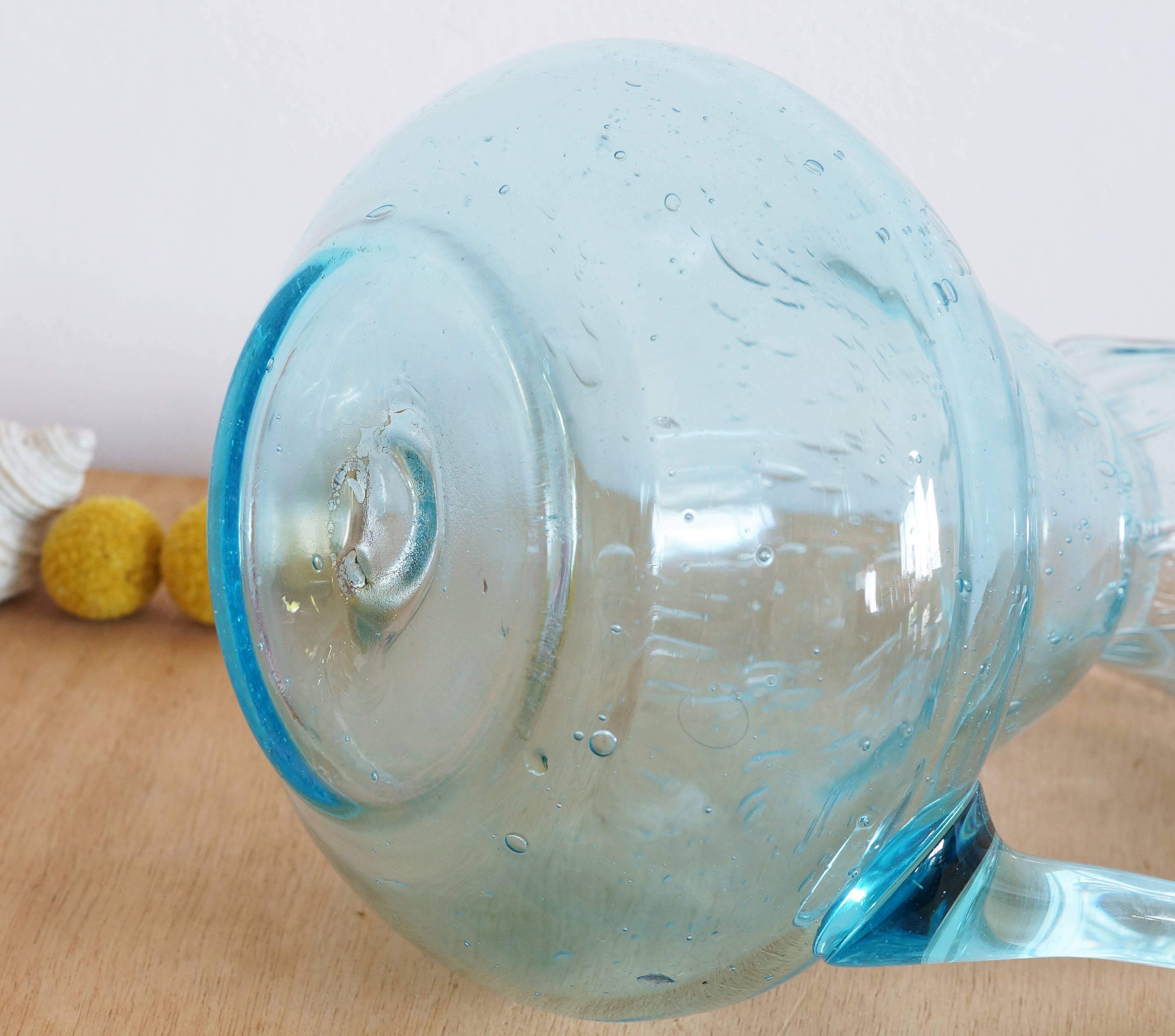 Blue carafe in bubble blown glass