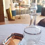 Blown glass decanter, engraved and chiselled. Made in France.