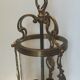 Old lantern in bronze and glass