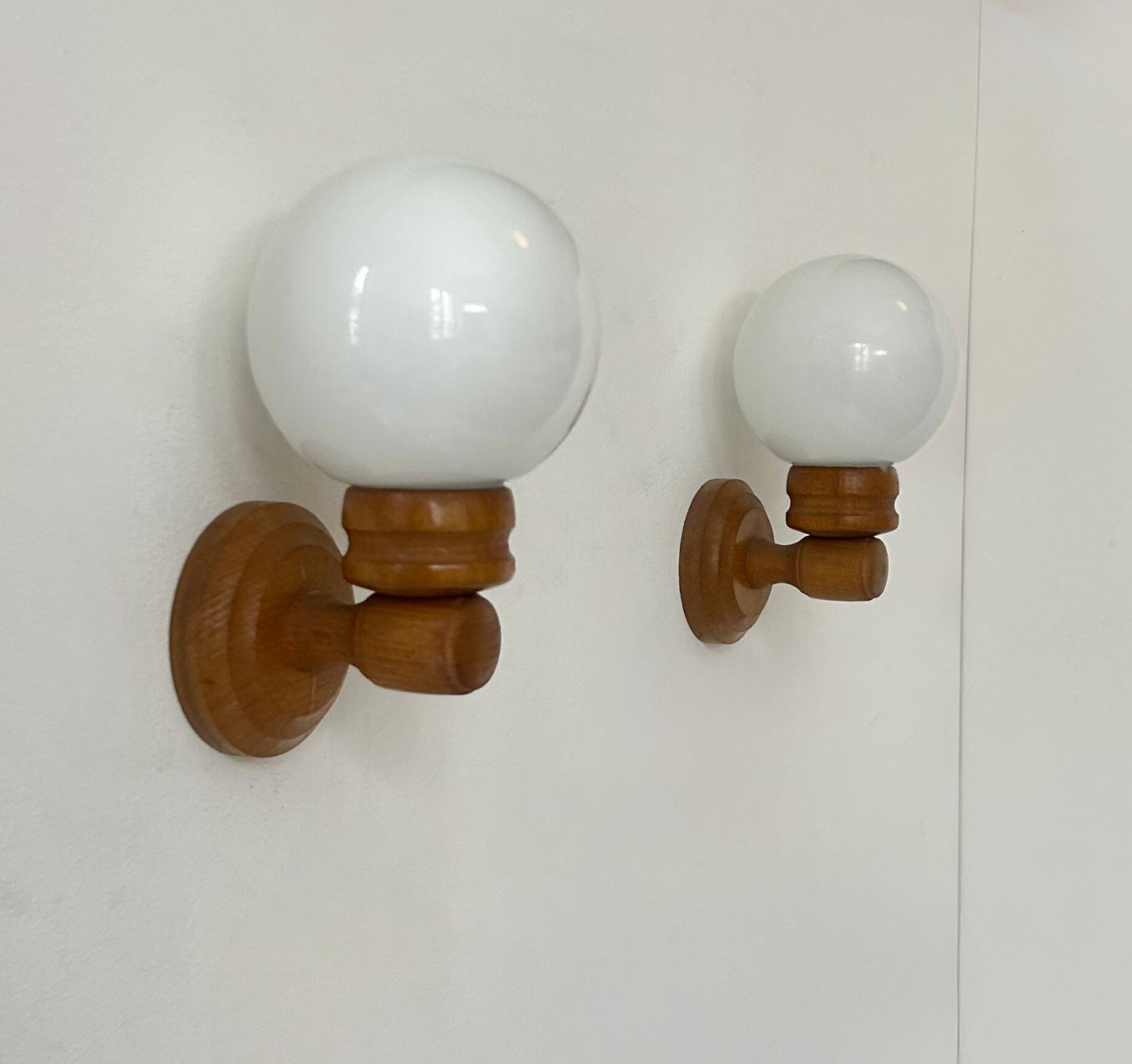 Pair of vintage wall lights, pine and opaline glass, France, 1980