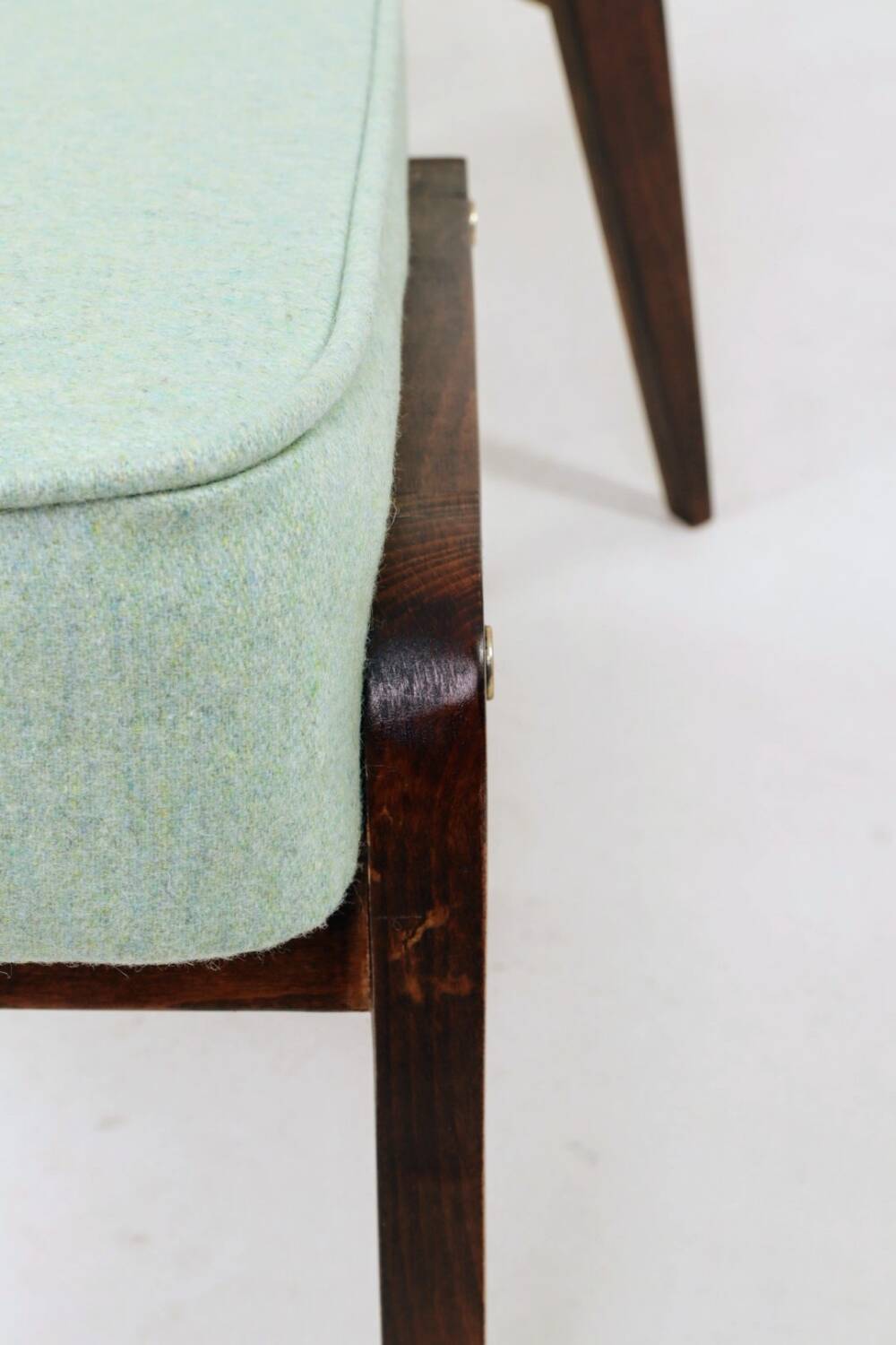 Vintage children's chair stool in pistachio green, mid-century modern design.