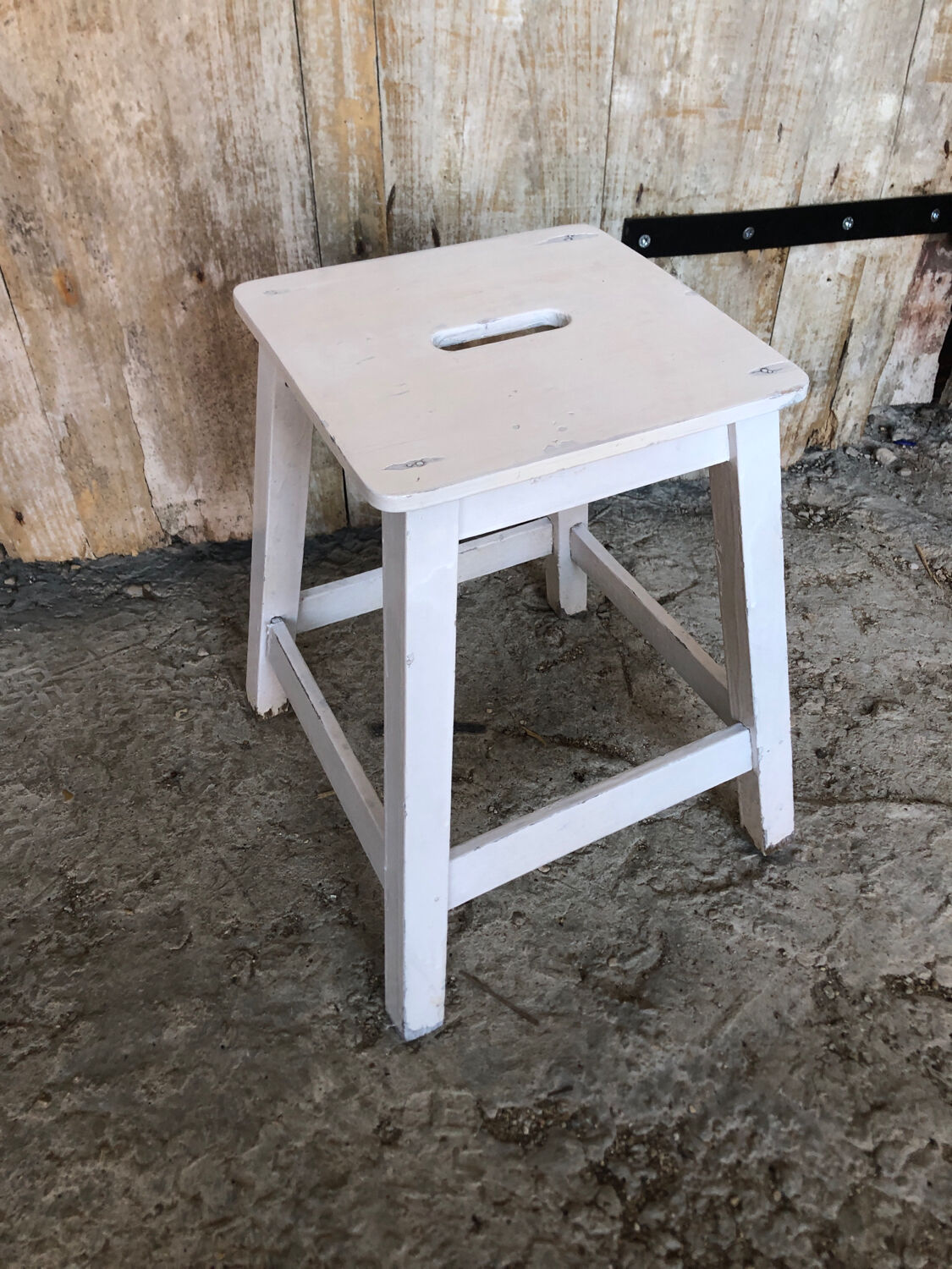 Vintage white wood milking stool