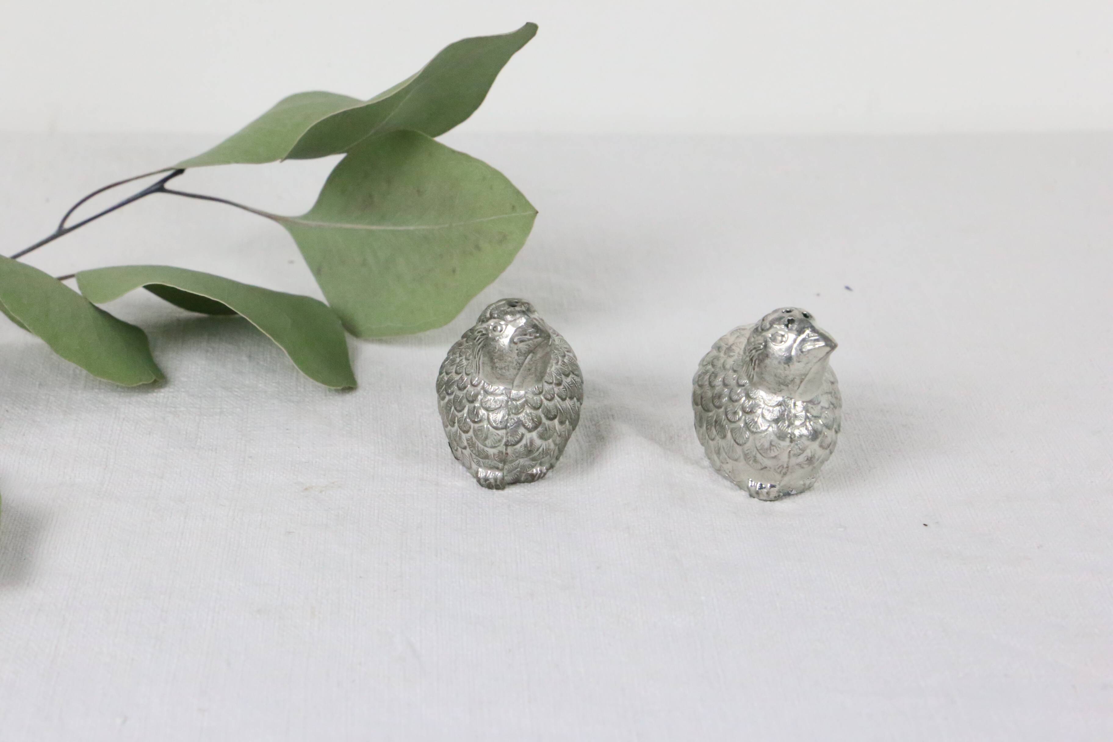 Metal salt and pepper shakers depicting two quails, 1970