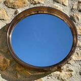 Vintage round smoked plastic mirror, circa 1970s.