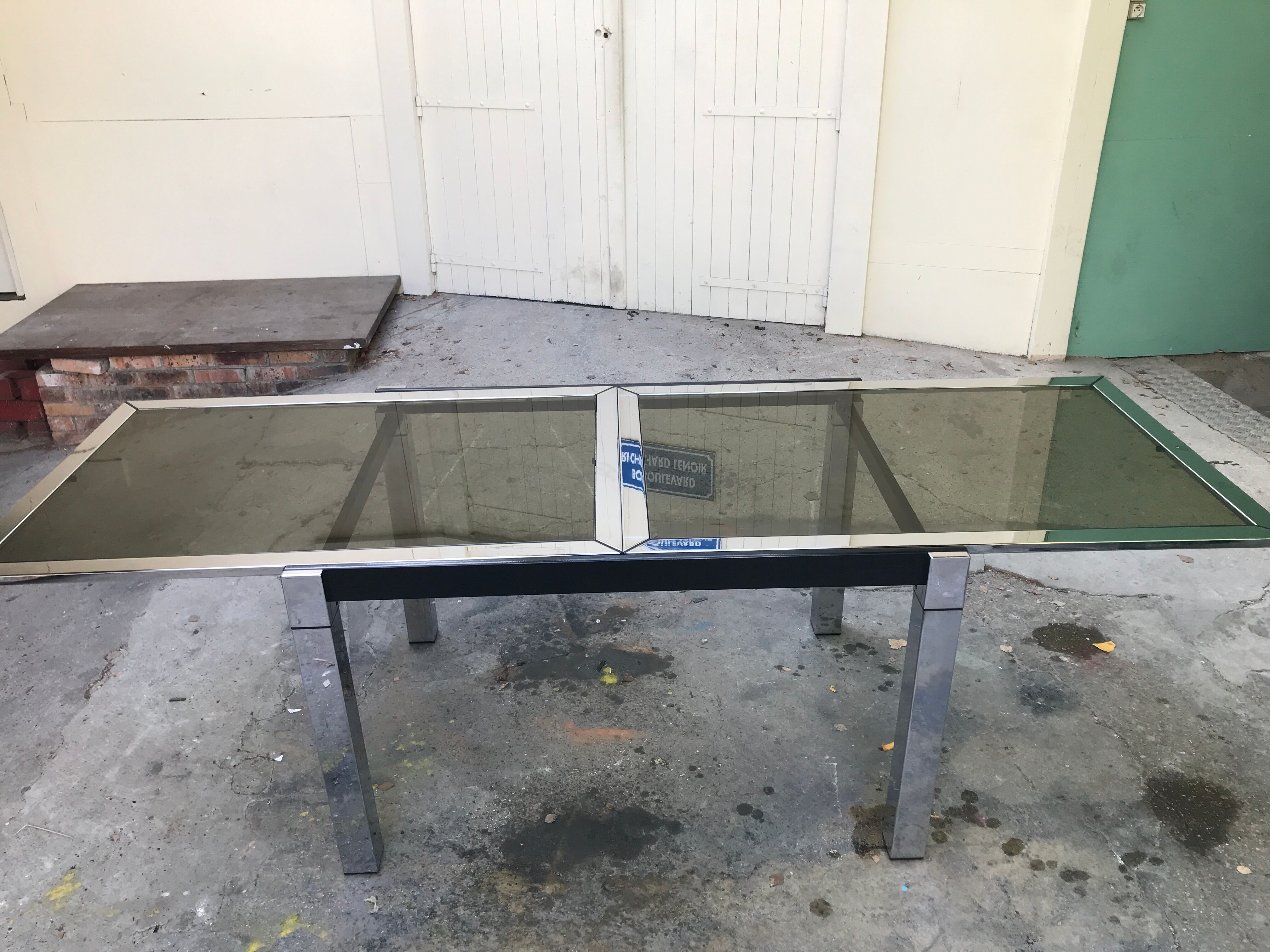 Chrome dining table and glass system