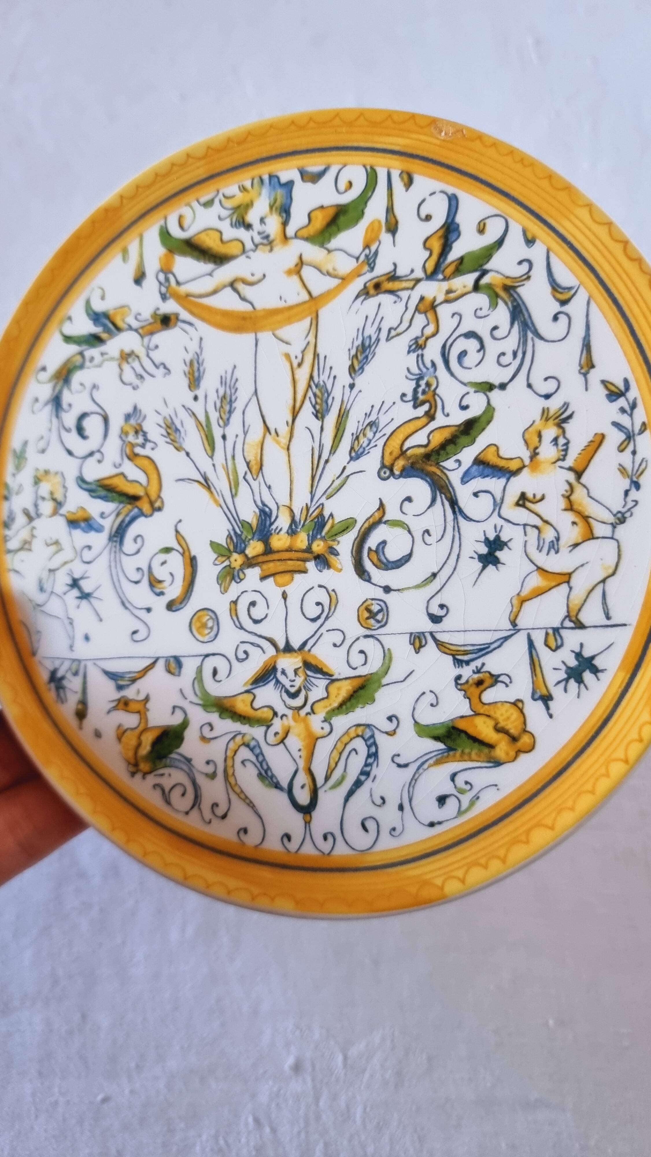 Vintage Italian raised plate in hand-painted ceramic.