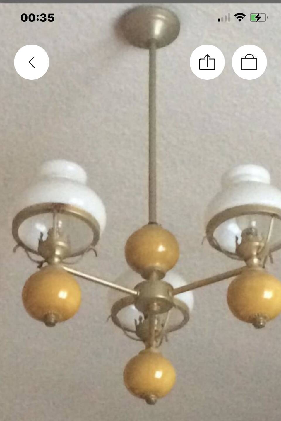 Vintage brass pendant light with opaline porcelain from the 1950s.