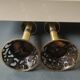 Pair of Hebrew Candlesticks. In antique gold-plated brass. Signed FFS Israel