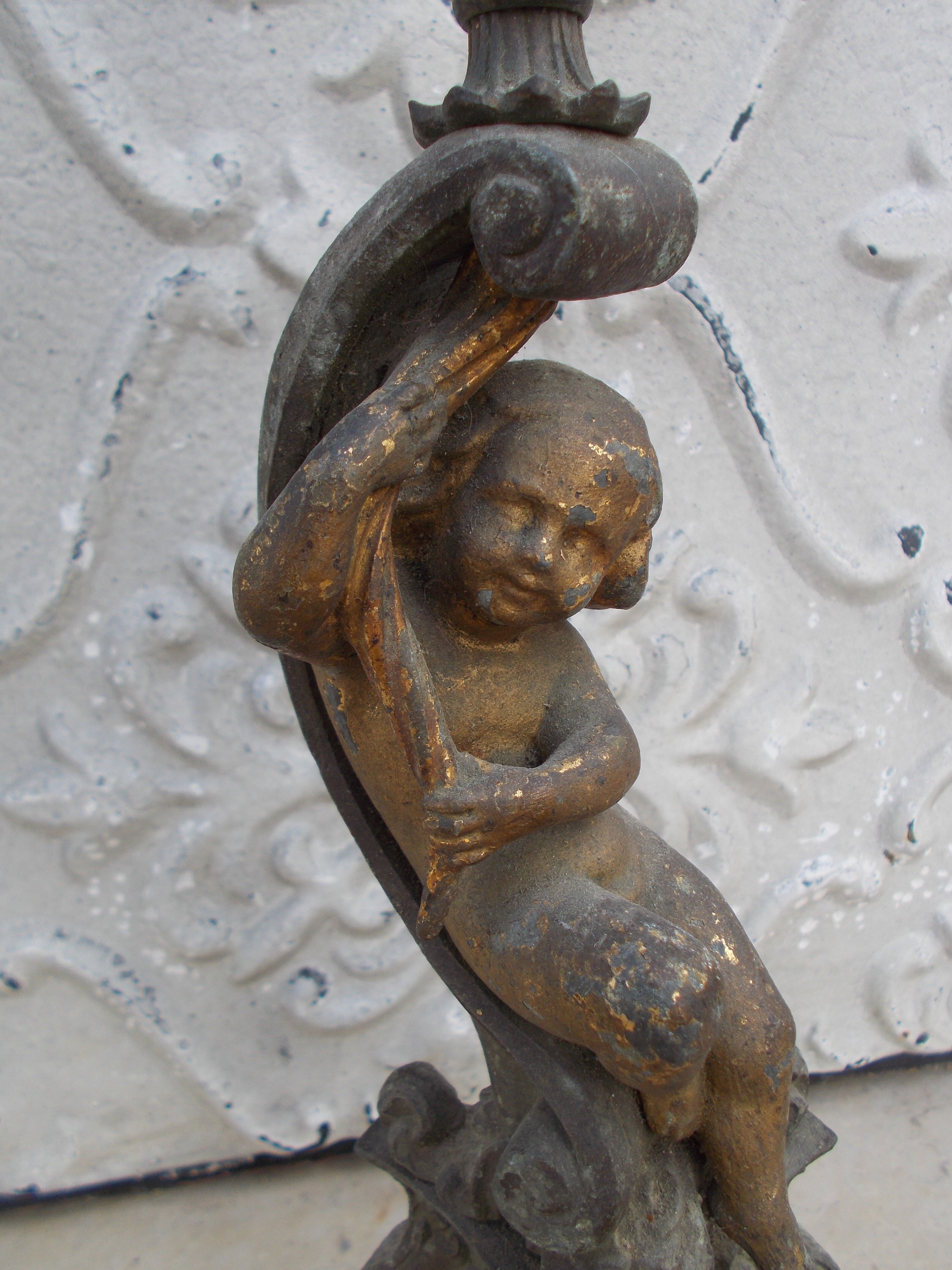 Bougeoir ancien putto regule