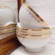 Trio de bols en porcelaine blanc et or
