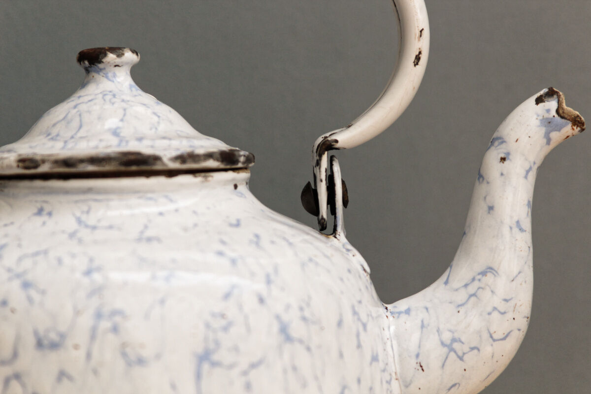 Old enamelled sheet metal kettle