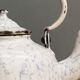 Old enamelled sheet metal kettle