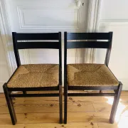 Pair of straw-seated wooden chairs in the regain style.