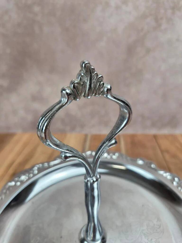 Small vintage round display stand in chrome metal – rococo style