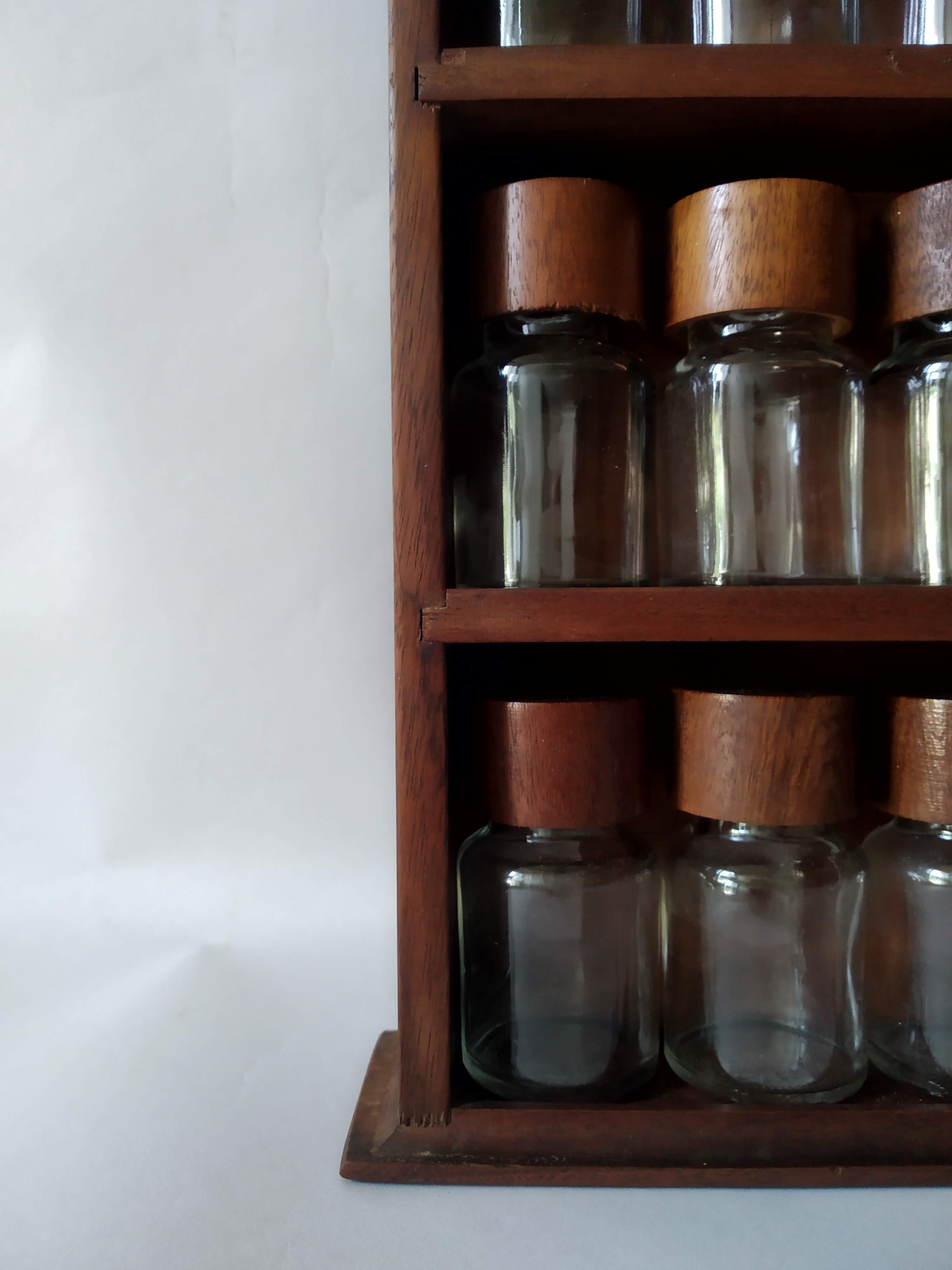 Wooden shelf with 32 vintage Cole & Mason spice jars
