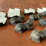 12 elongated brown bear-shaped knife rests