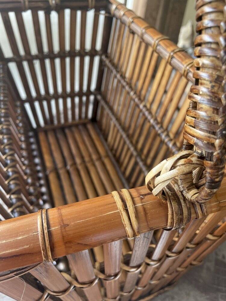 Brown wicker/rattan basket-shaped magazine rack