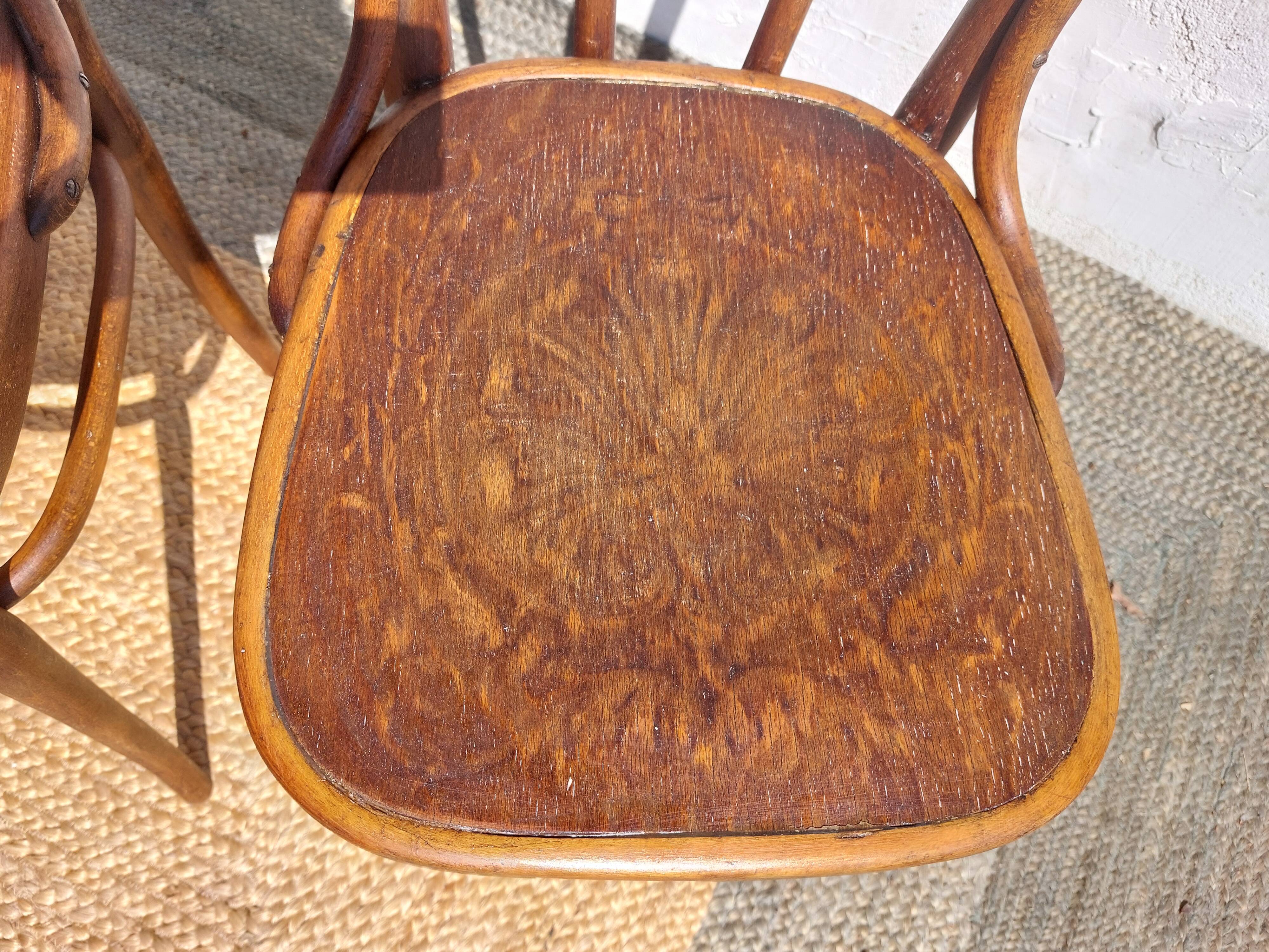 set of 3 curved wooden bistro chairs with patterns