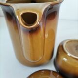 Coffee pot and sugar bowl in glazed stoneware, deep brown glazes.