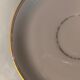 Service à thé en porcelaine (Limoges) 35 pieces monogrammè à liseré doré