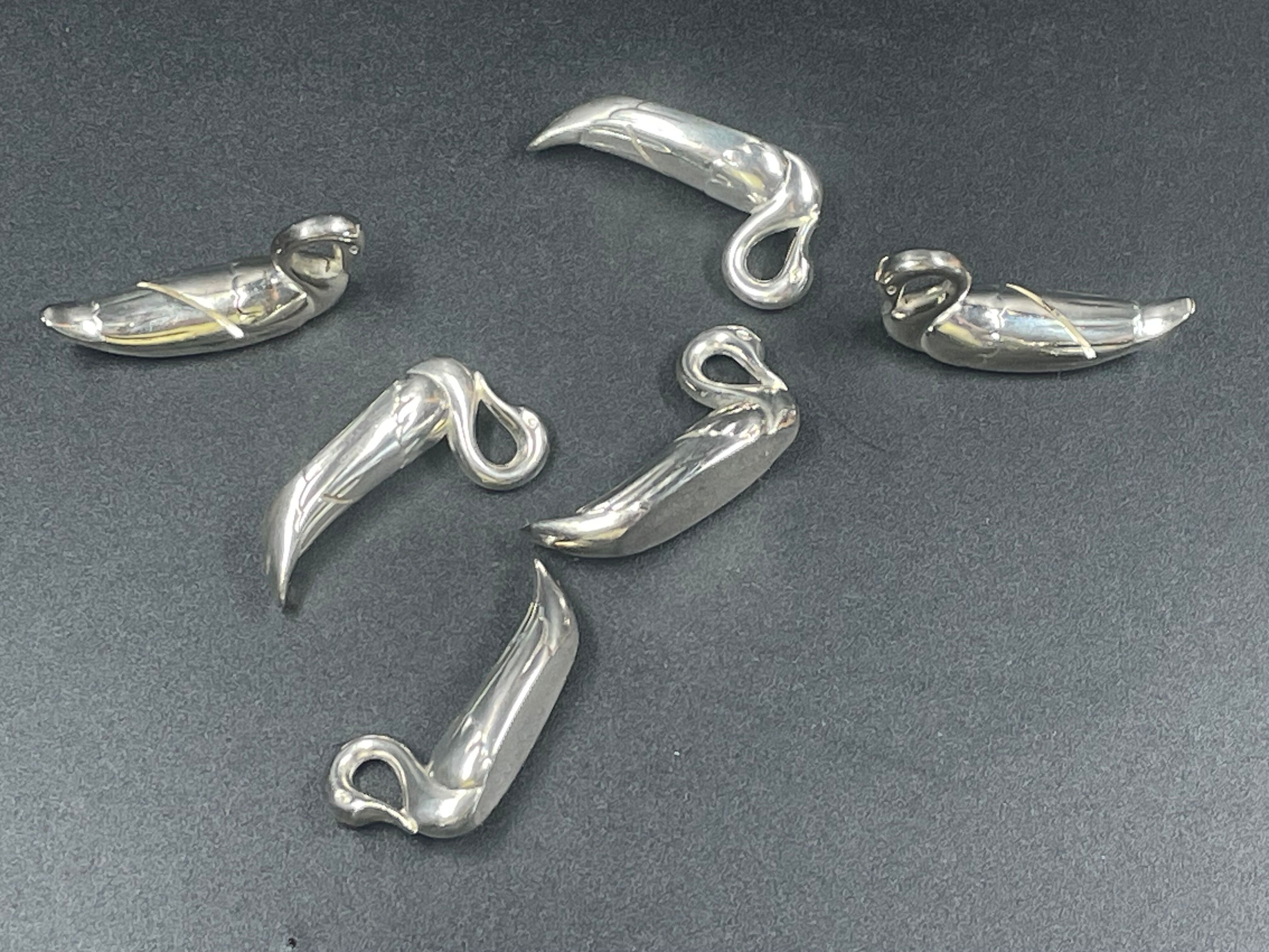 Set of 6 silver metal knife holders for table