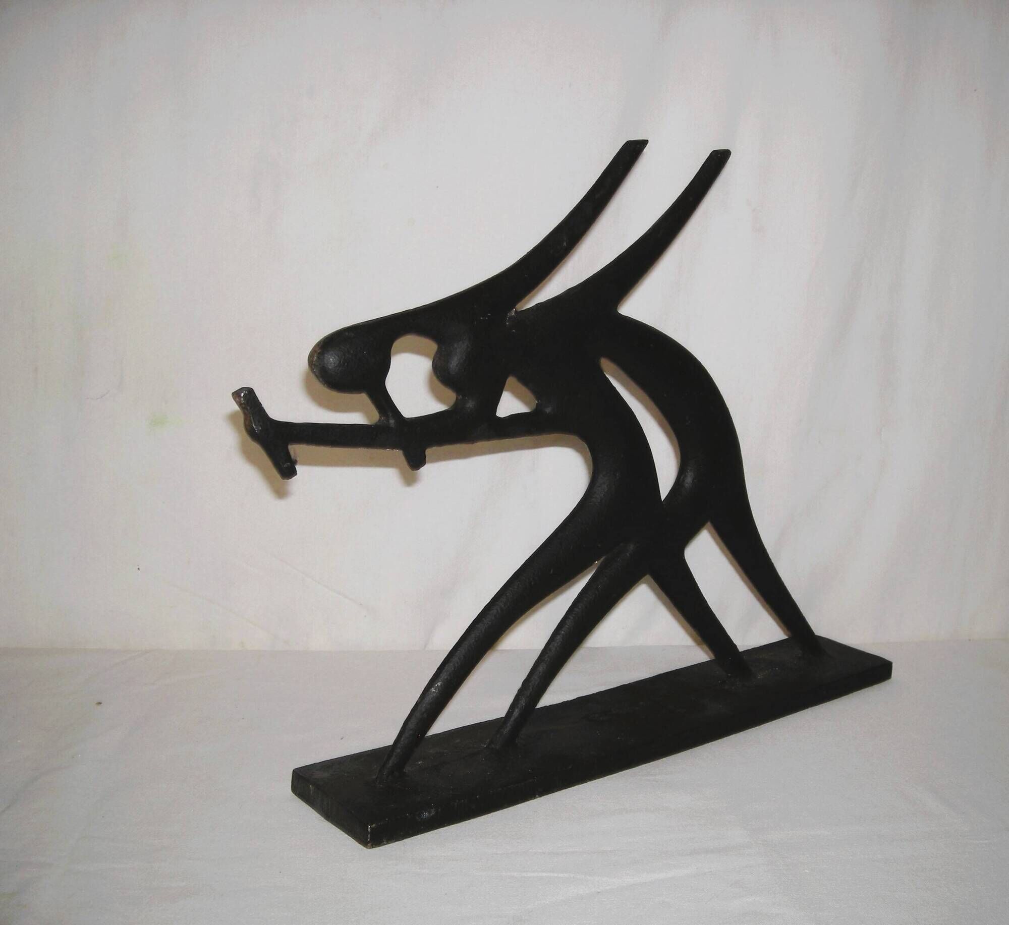 Modernist cast iron statuette from the 1950s.