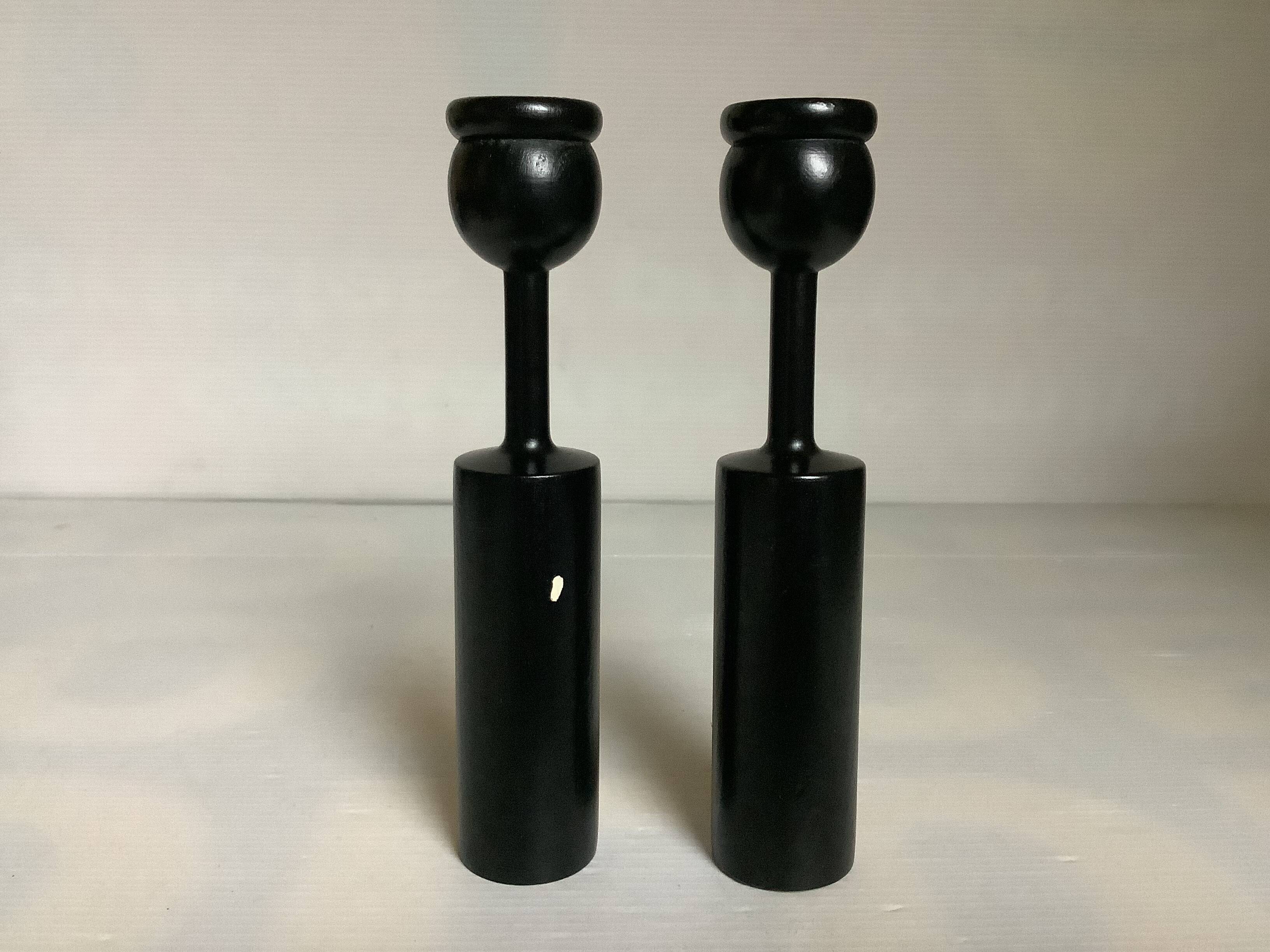 Pair of painted wooden candlesticks