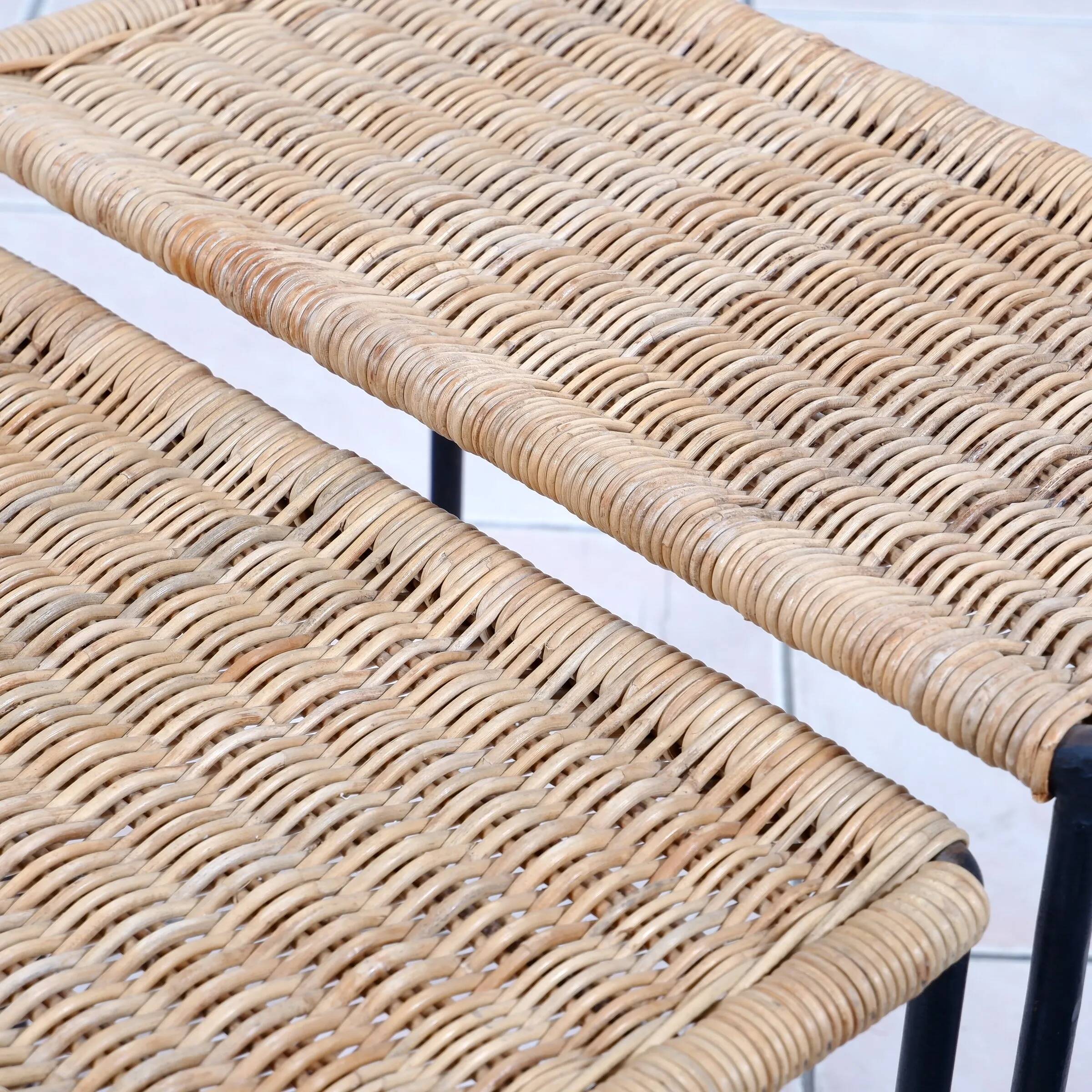 Nesting tables in metal / rattan by Carl Auböck
