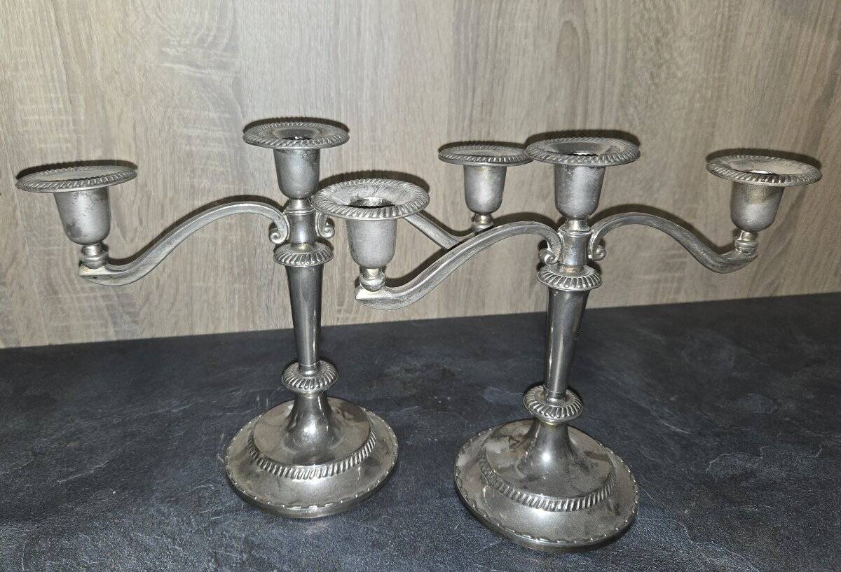 Pair of three-light candlesticks in silver-plated metal