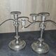 Pair of three-light candlesticks in silver-plated metal
